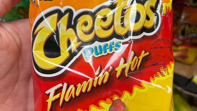 Cheetos Puffs Flamin' Hot.