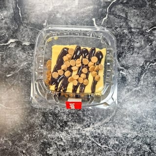 Cheesecake with Hershey Drizzle and Reeses Peanut Butter Cup Chips